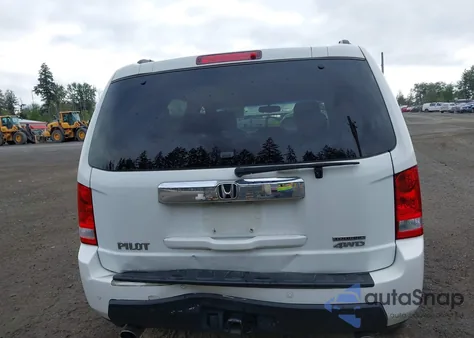 2010 Honda Pilot Touring z USA, uszkodzony, nr VIN 5FNYF4H92AB031653